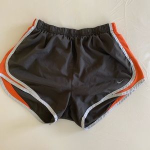 Gray and orange Nike shorts